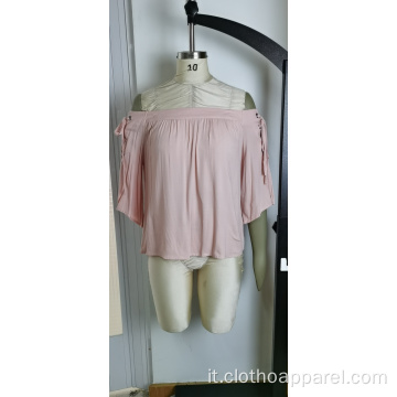 Top rosa con spalle scoperte da donna all&#39;ingrosso